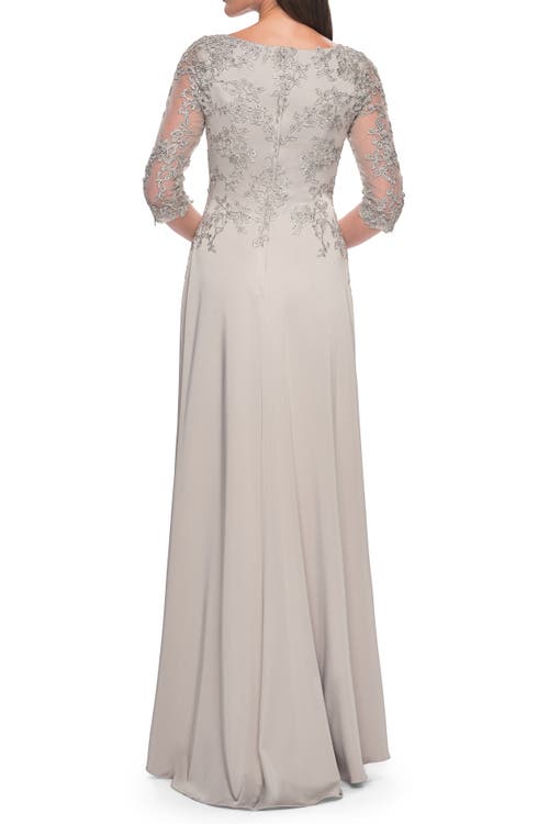 La Femme Jersey Gown With Boat Neckline And Lace Detailing In Silver