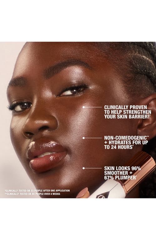 Shop Charlotte Tilbury Unreal Skin Sheer Glow Tint Hydrating Foundation Stick In 15 Deep