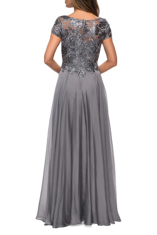 Shop La Femme Short Sleeve Metallic Lace Evening Dress With Chiffon Skirt In Platinum