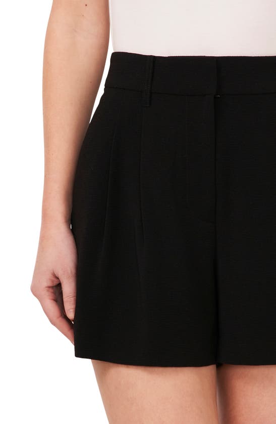 Shop Cece Pleated High Waist Shorts In Rich Black