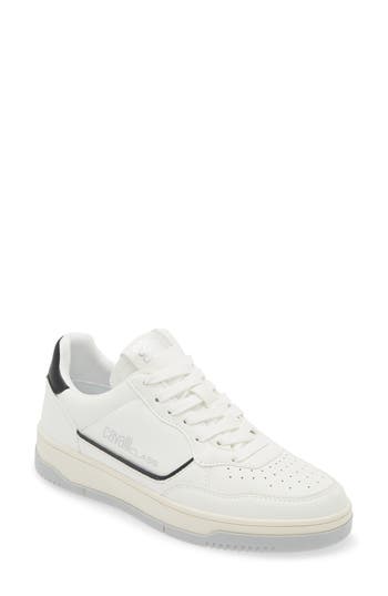 Shop Roberto Cavalli Low Top Perforated Sneaker In White/black