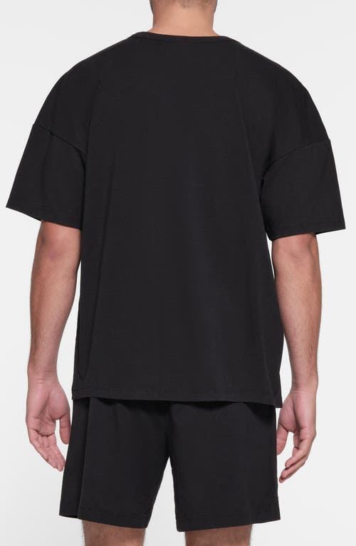 Shop Skims Oversize Stretch Crewneck T-shirt In Obsidian