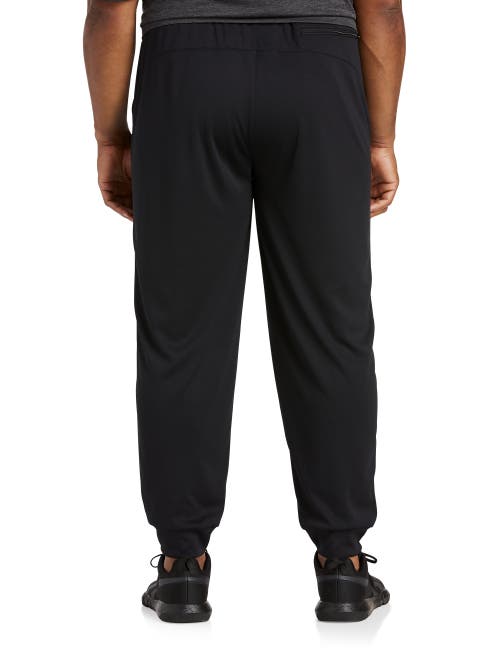 Shop Reebok Performance Double-knit Ribbed-hem Joggers In Black