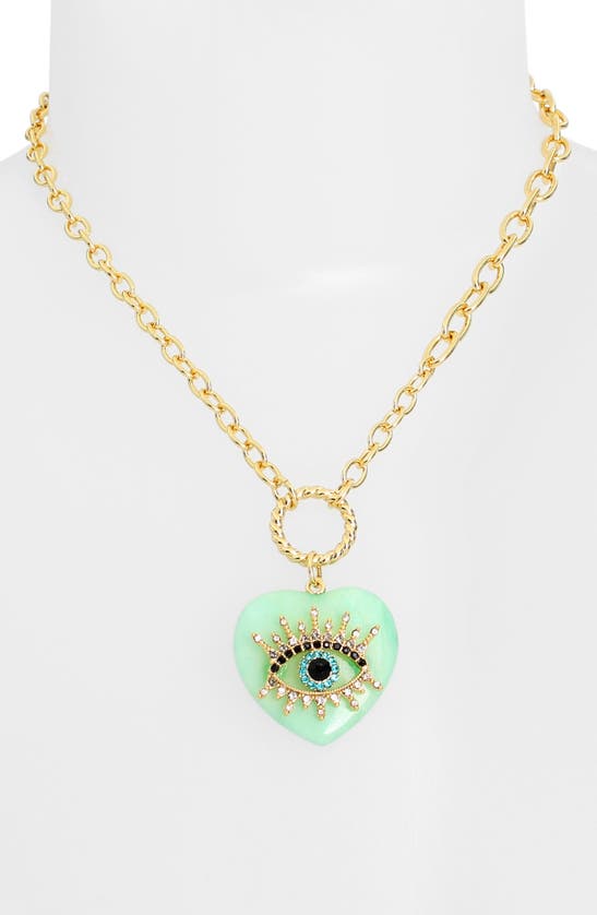 Shop Kurt Geiger London Evil Eye Heart Pendant Necklace In Green