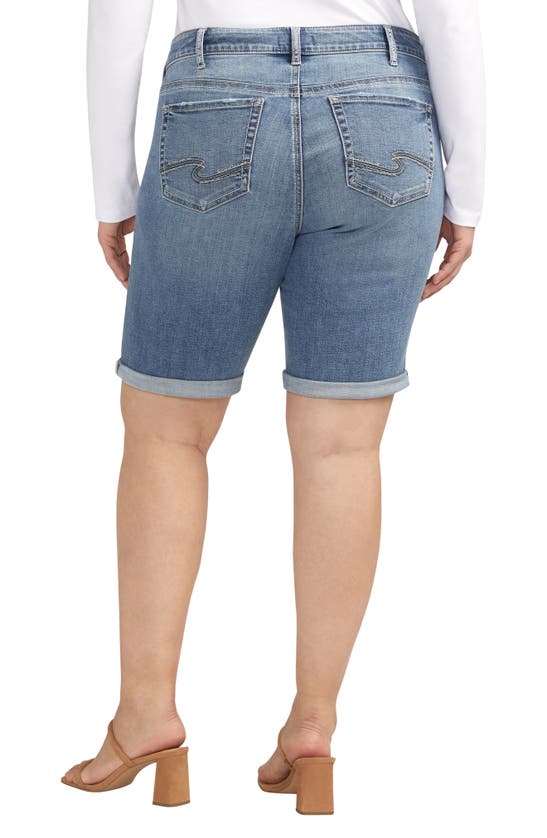 Shop Silver Jeans Co. Elyse Mid Rise Denim Bermuda Shorts In Indigo
