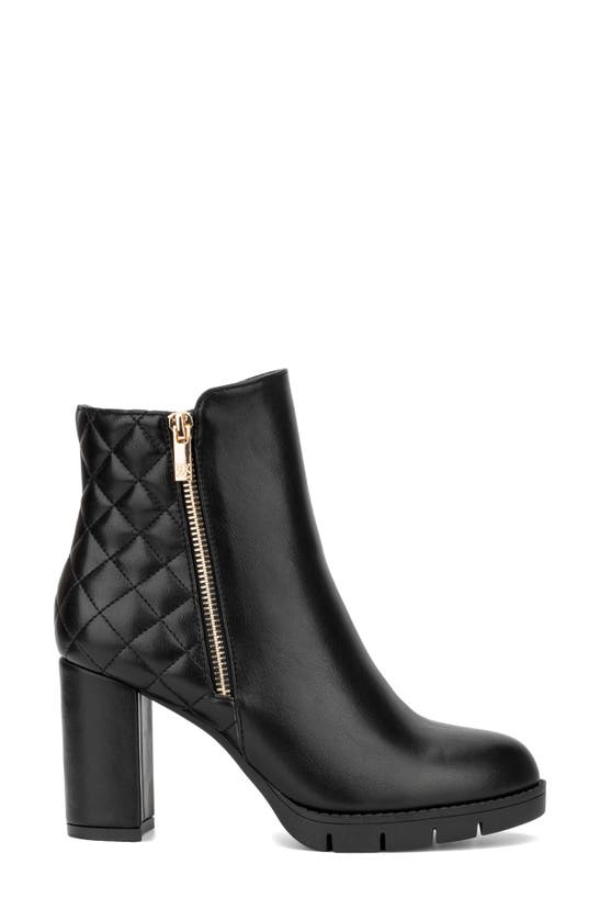 Shop New York And Company Emmalynn Faux Leather Quilted Bootie In Black