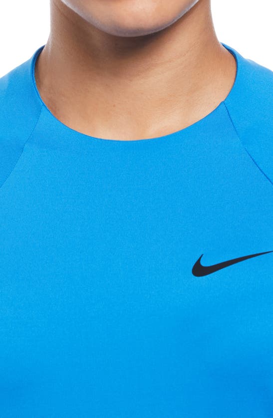 Shop Nike Essential Dri-fit Long Sleeve Hydroguard Top In Photo Blue