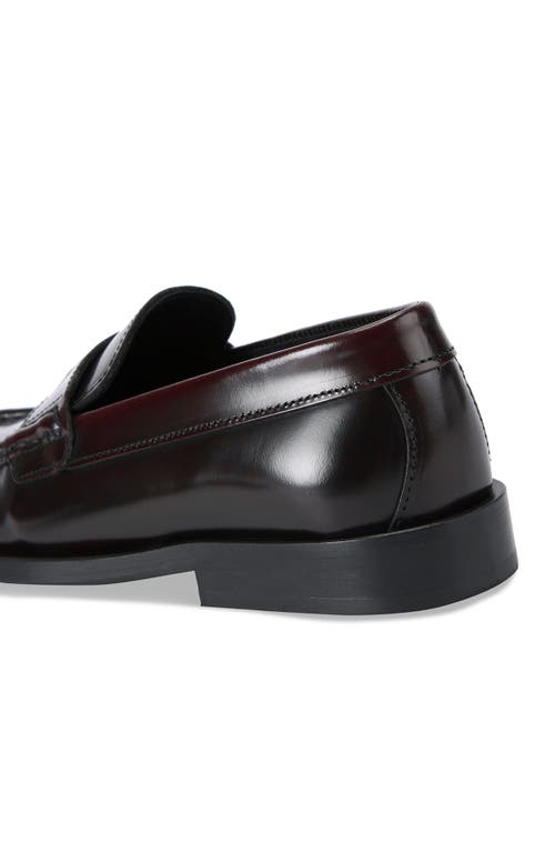 Shop Kurt Geiger London Luis Eagle Coin Penny Loafer In Medium Red