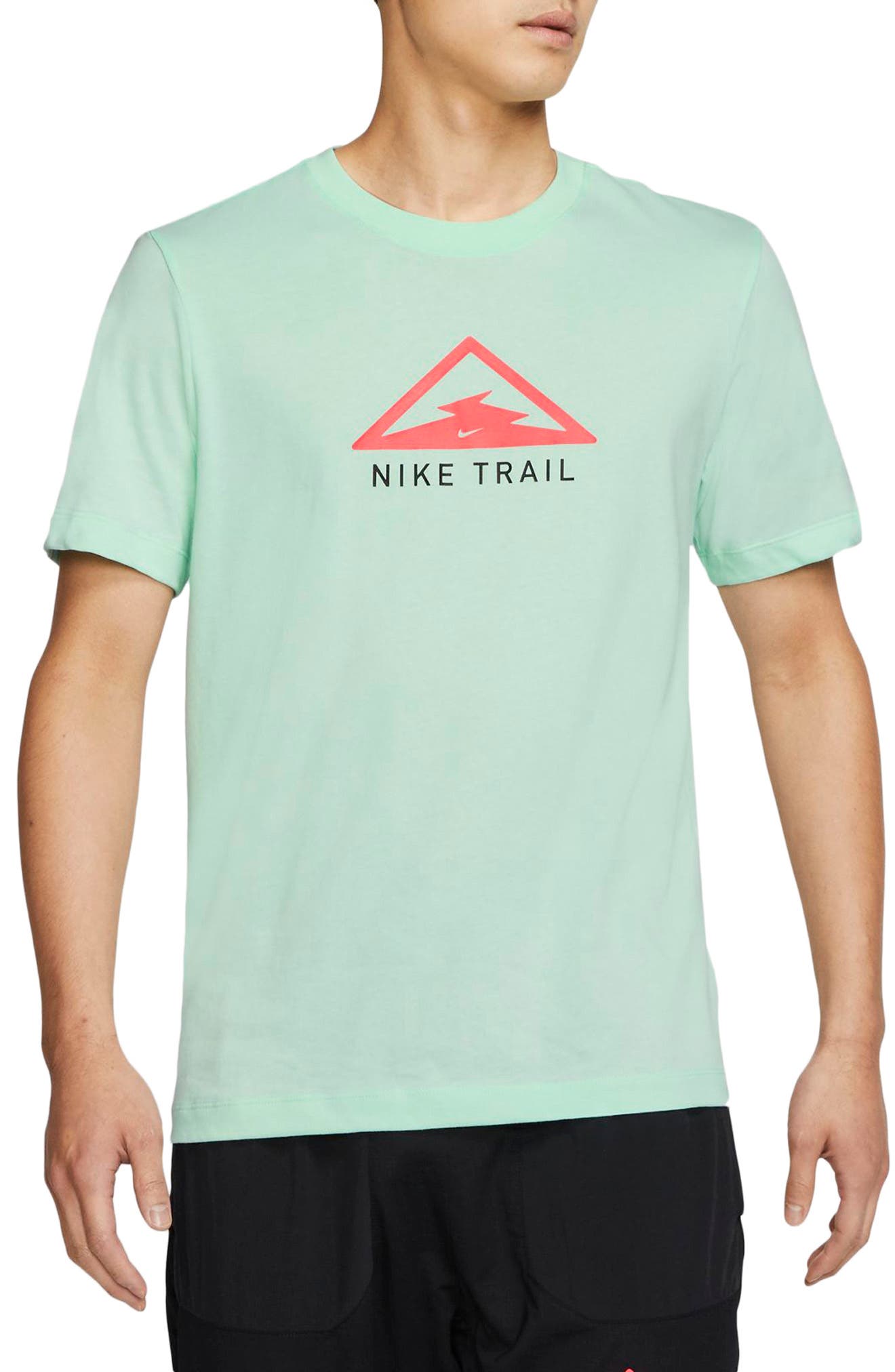 mint color nike shirt