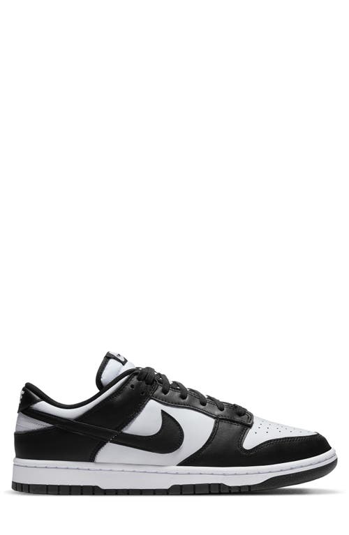 Shop Nike Dunk Low Retro Basketball Sneaker In White/black/white