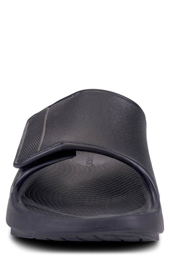 Shop Oofos Gender Inclusive Ooahh Sport Flex Slide Sandal In Matte Black
