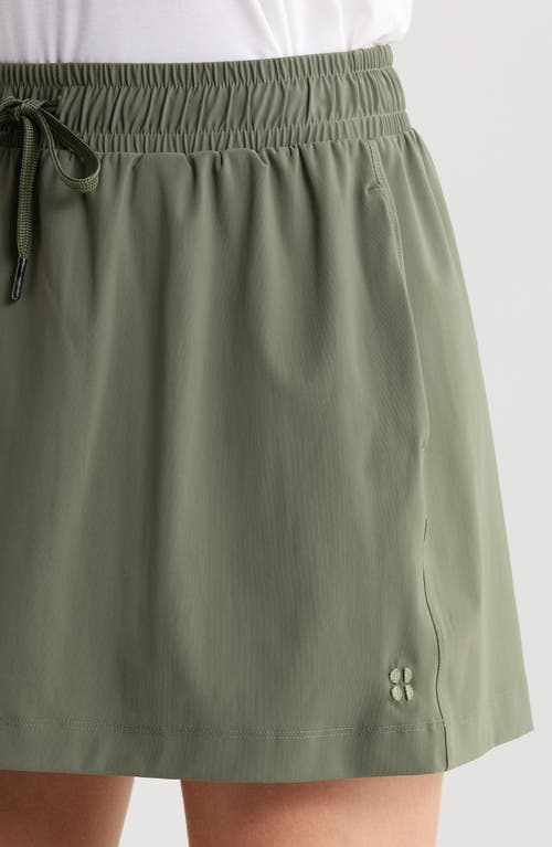 Shop Sweaty Betty Explorer Miniskirt In Ivy Green