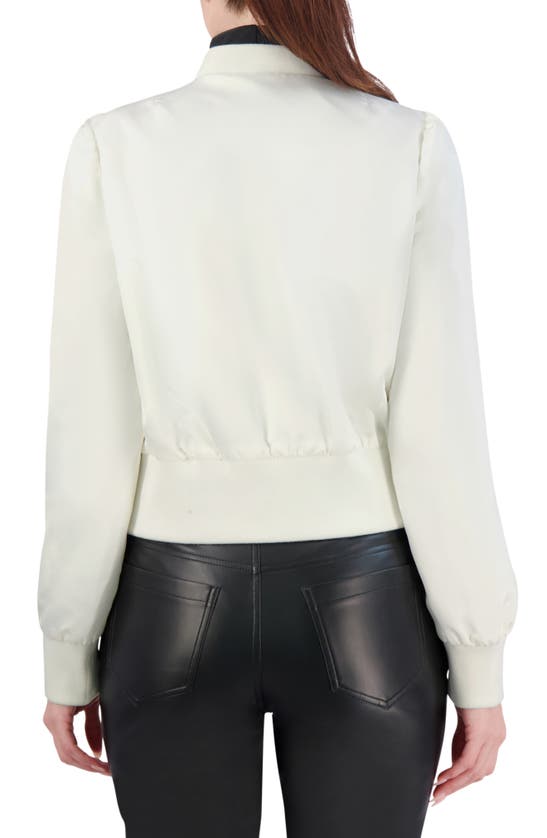 Shop Ookie & Lala Satin Crop Bomber Jacket In White