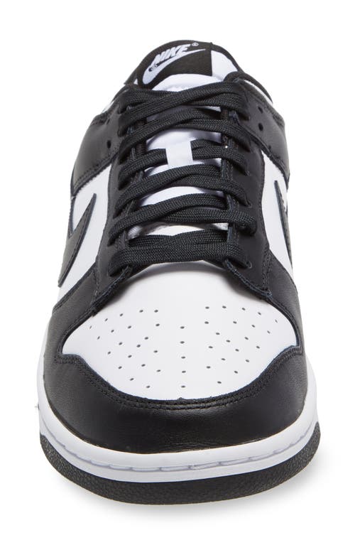 Shop Nike Dunk Low Retro Basketball Sneaker In White/black/white