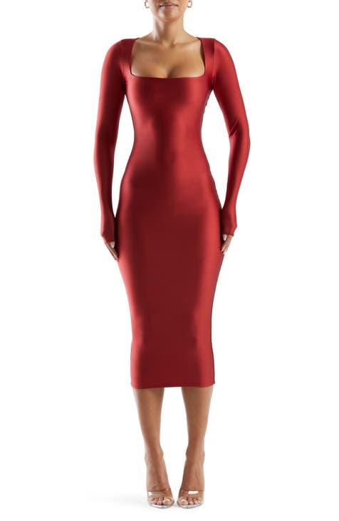 red midi dress worn with black turtleneck and accessories
