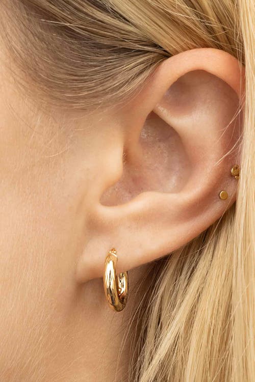 Oradina 14k Yellow Gold Day And Night Mini Hoops In Yellow Gold