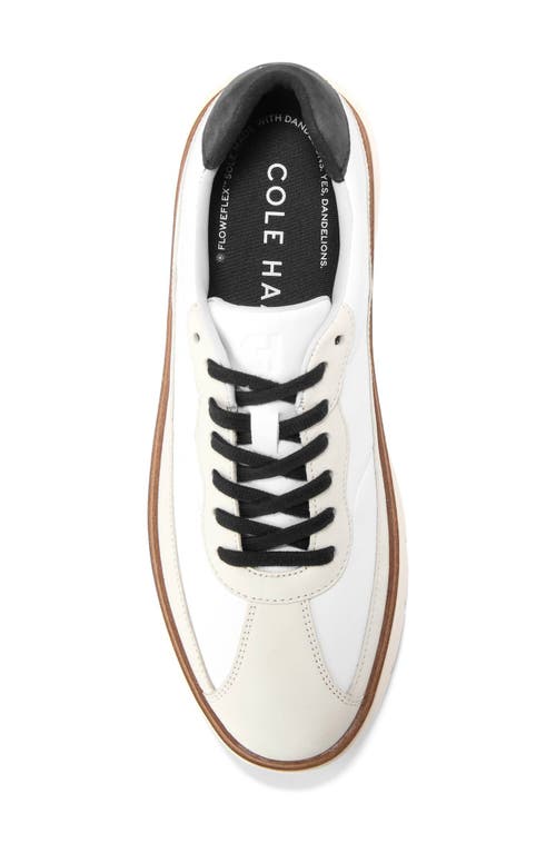 Shop Cole Haan Grandpro Featherarc Sneaker In White/blac