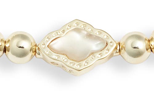 Shop Kendra Scott Abbie Beaded Stretch Bracelet In Gold Natural Mother Of Pearl