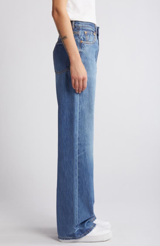 Shop Purple Brand Coated Wide Leg Jeans In Mid Indigo