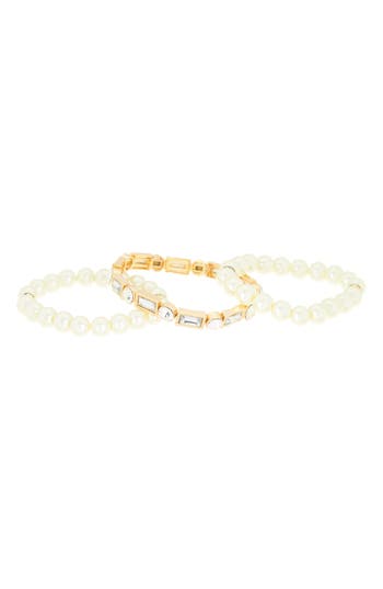 Shop Tasha Set Of 3 Imitation Pearl & Crystal Stretch Bracelets In Ivory/gold