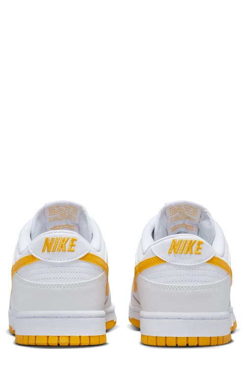 Shop Nike Dunk Low Retro Basketball Sneaker In White/university Gold/white