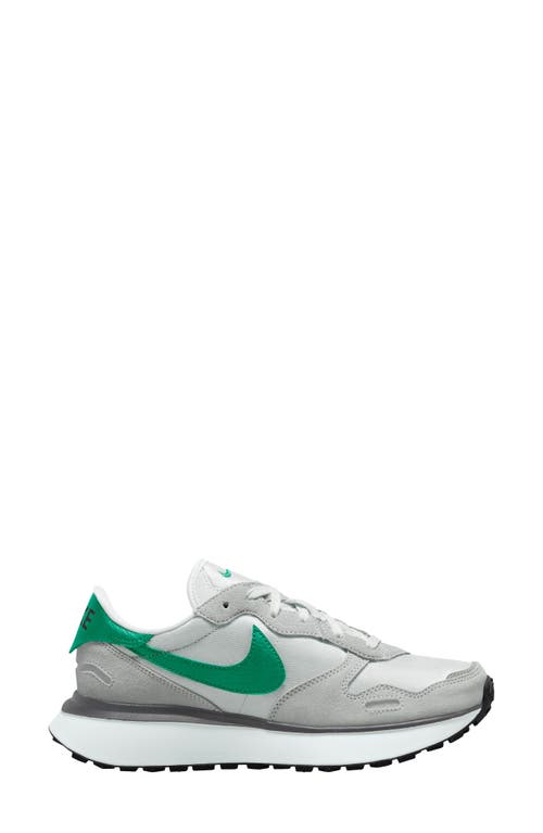 Shop Nike Phoenix Waffle Sneaker In Summit White/green/photon