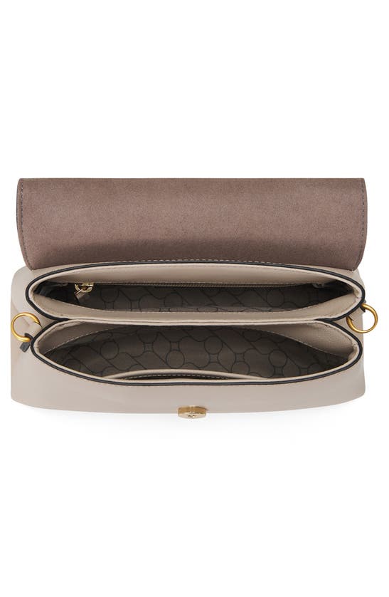 Shop Oryany Lottie Flap Crossbody Bag In Cream