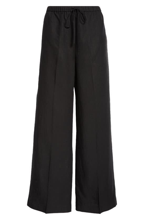 Shop Totême Fluid Drawstring Waist Pants In Black