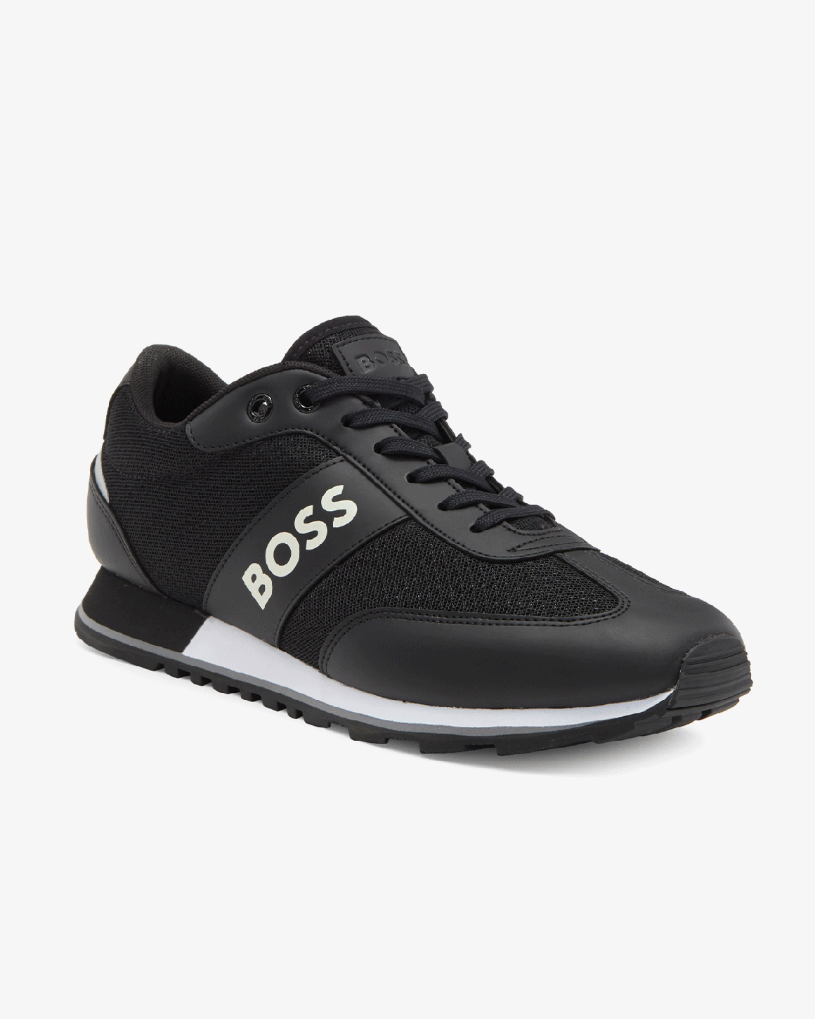A black BOSS shoe.