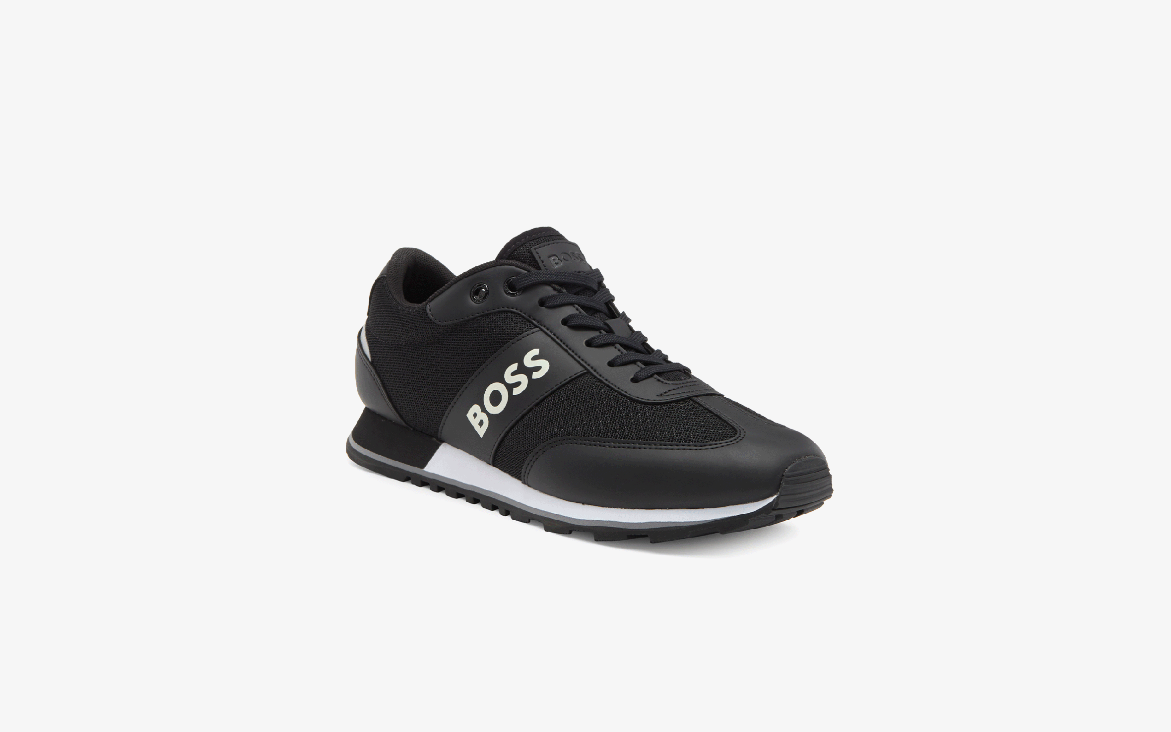 A black BOSS shoe.