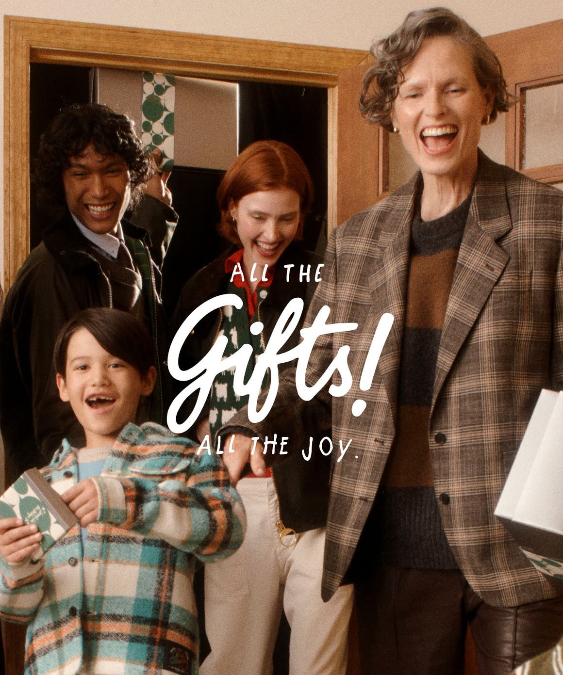 All the gifts! All the joy. Men, women and kids with gifts.