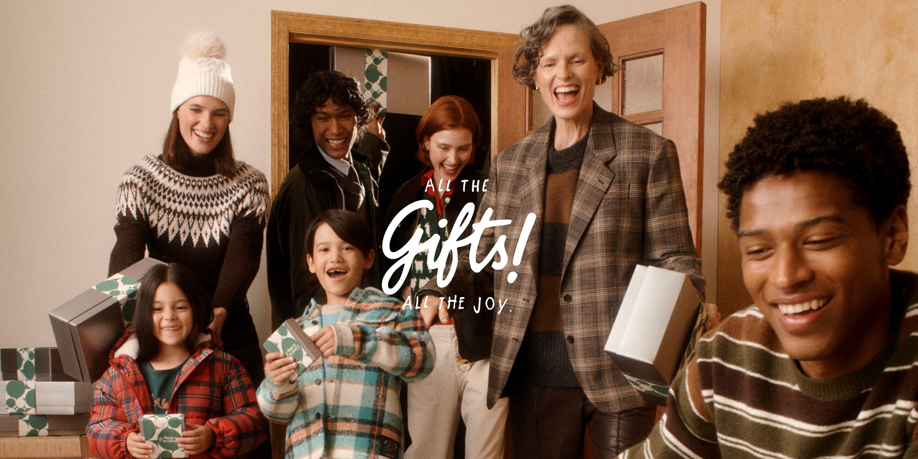 All the gifts! All the joy. Men, women and kids with gifts.