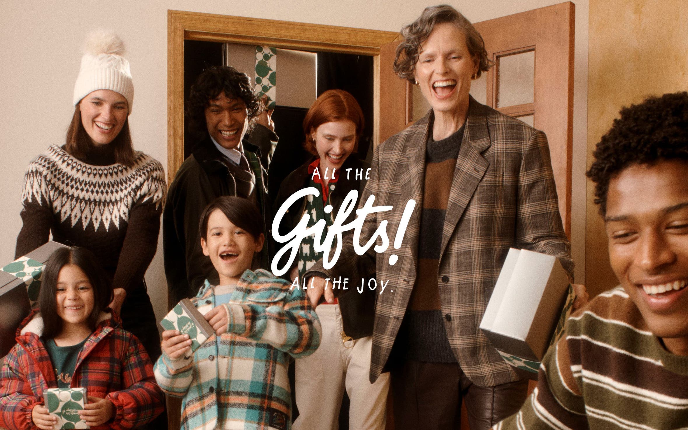 All the gifts! All the joy. Men, women and kids with gifts.