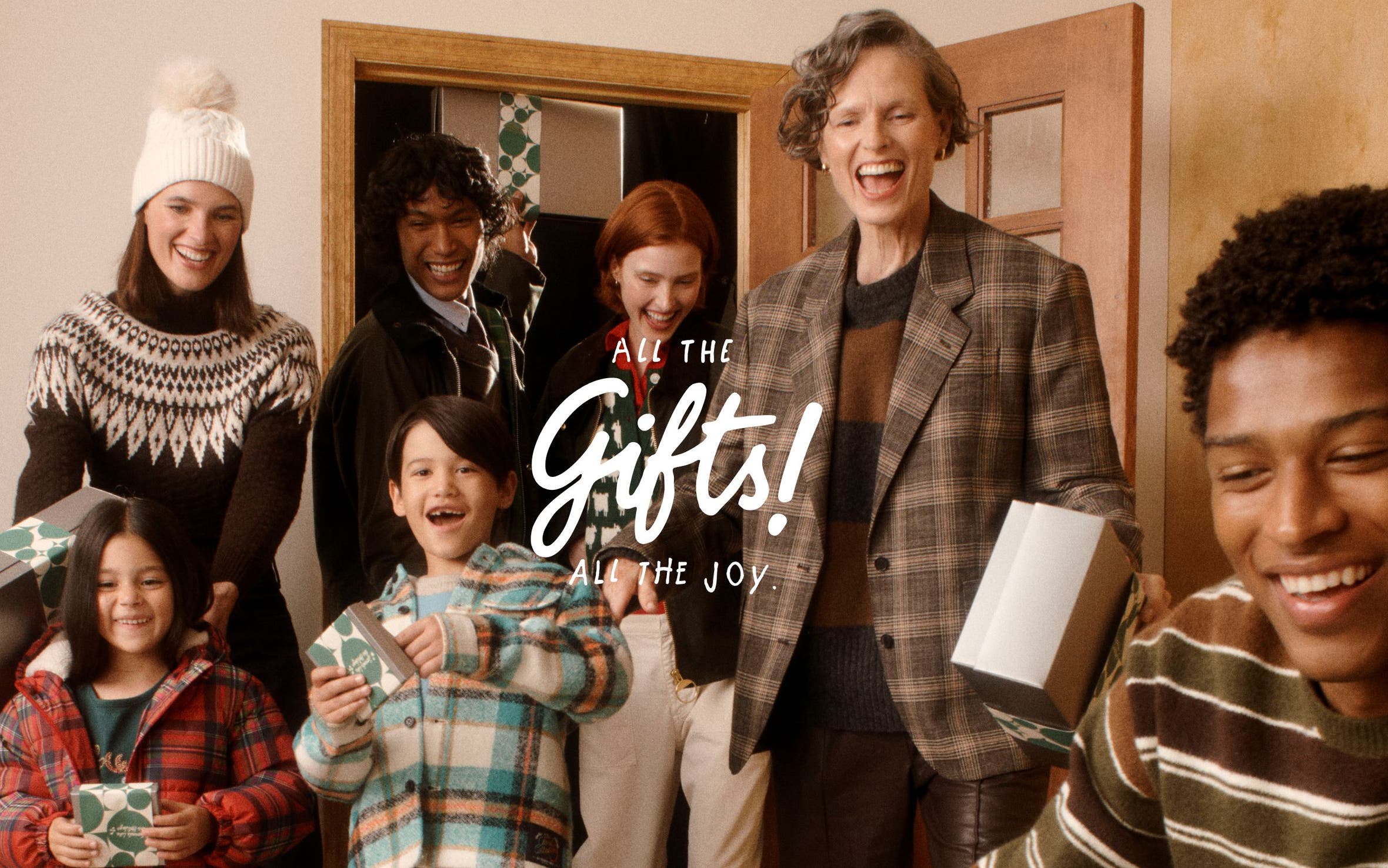 All the gifts! All the joy. Men, women and kids with gifts.