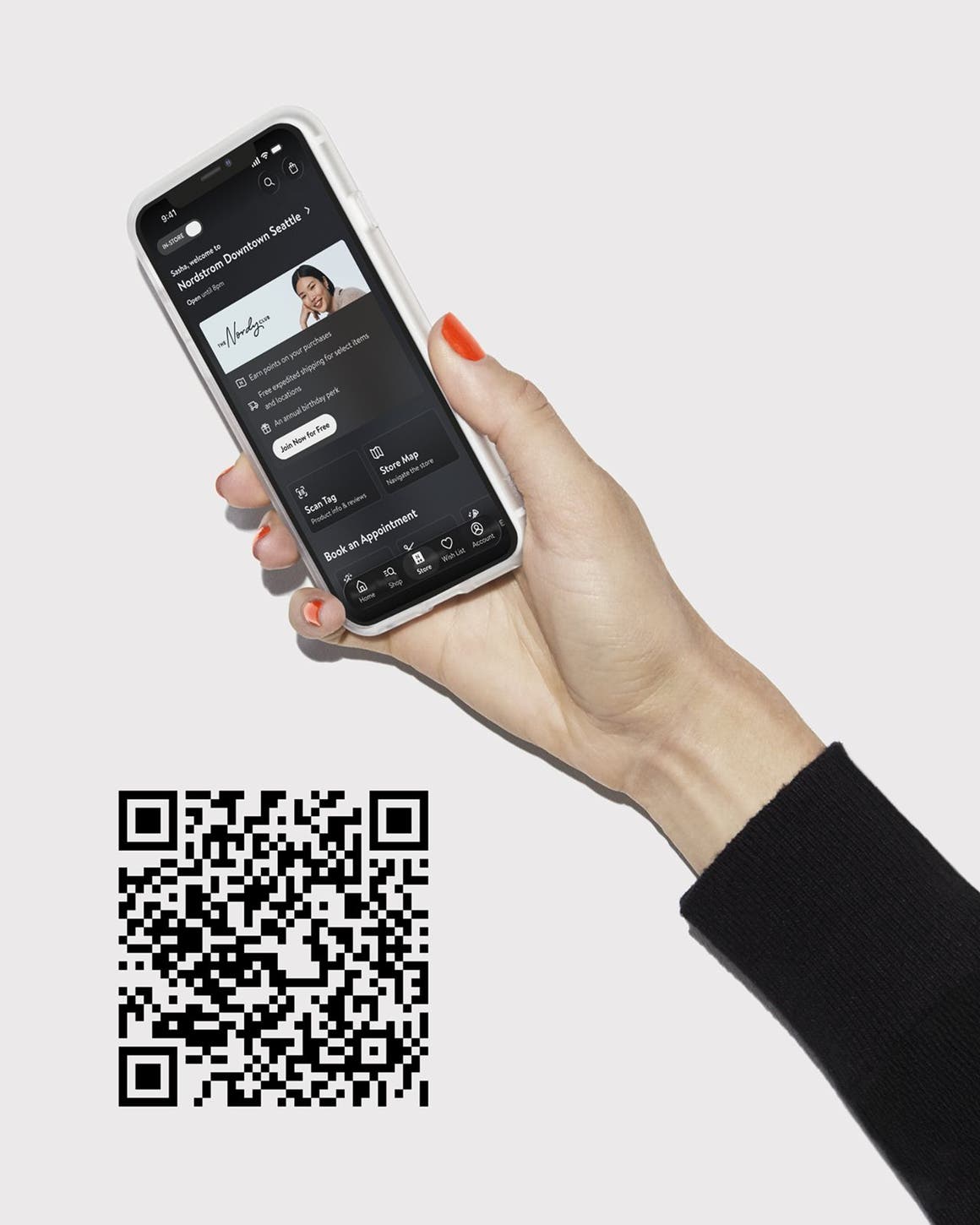 A hand holding a phone with the Nordstrom app open.