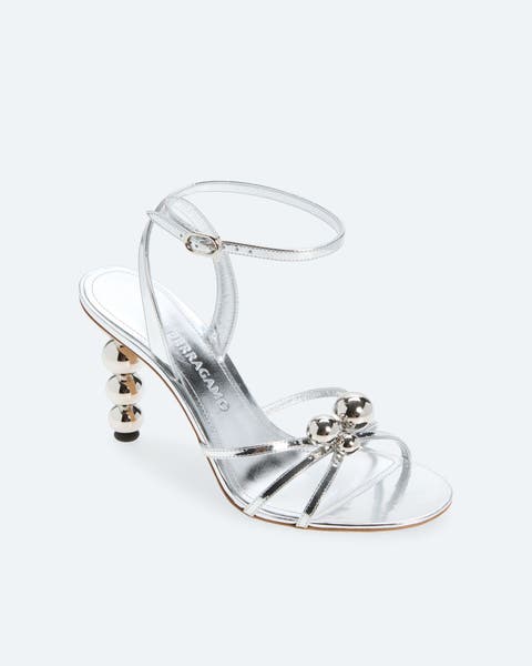 Silver heels by FERRAGAMO.