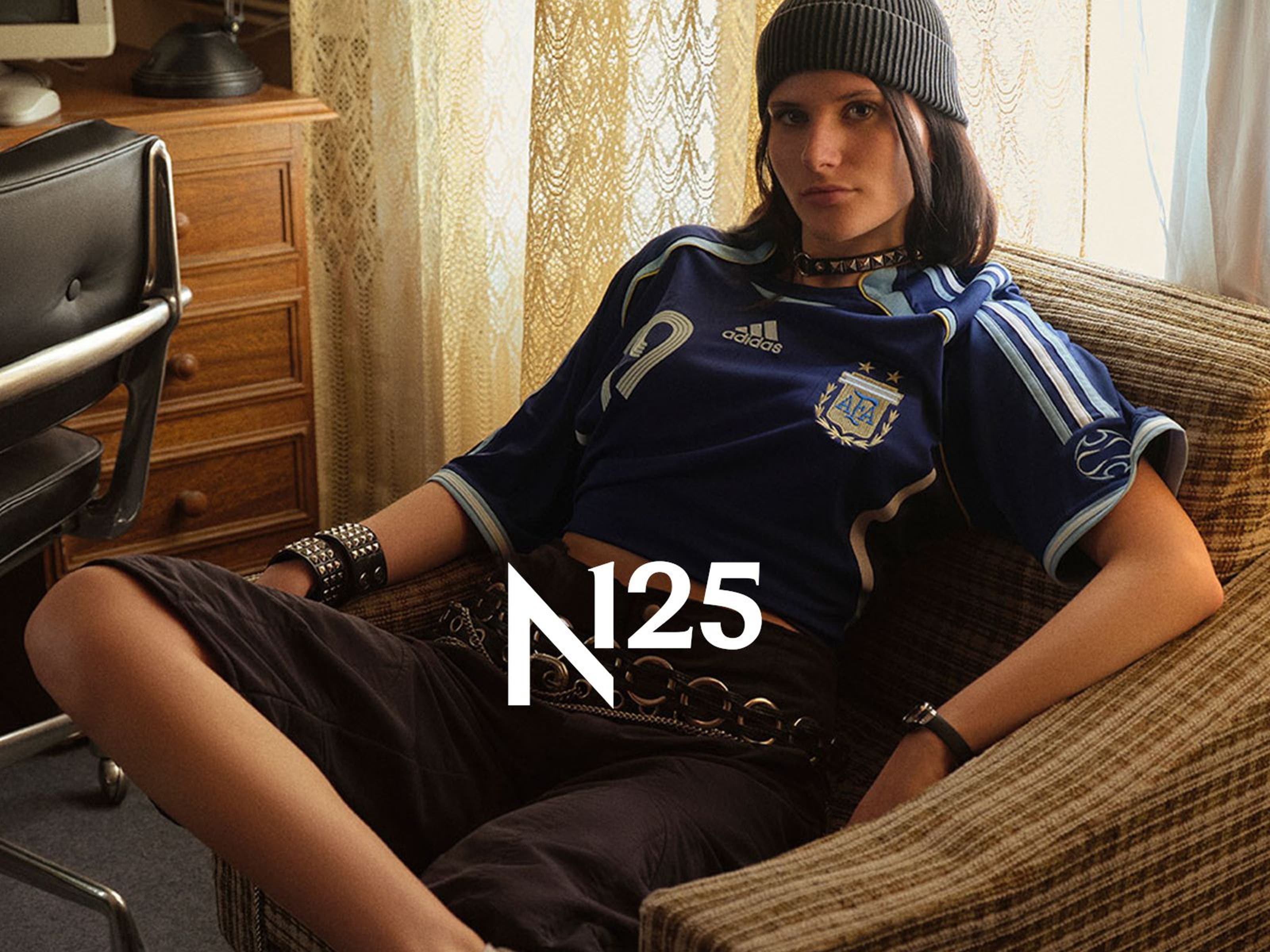Woman wearing adidas apparel and sneakers, part of Nordstrom's 125th celebration.