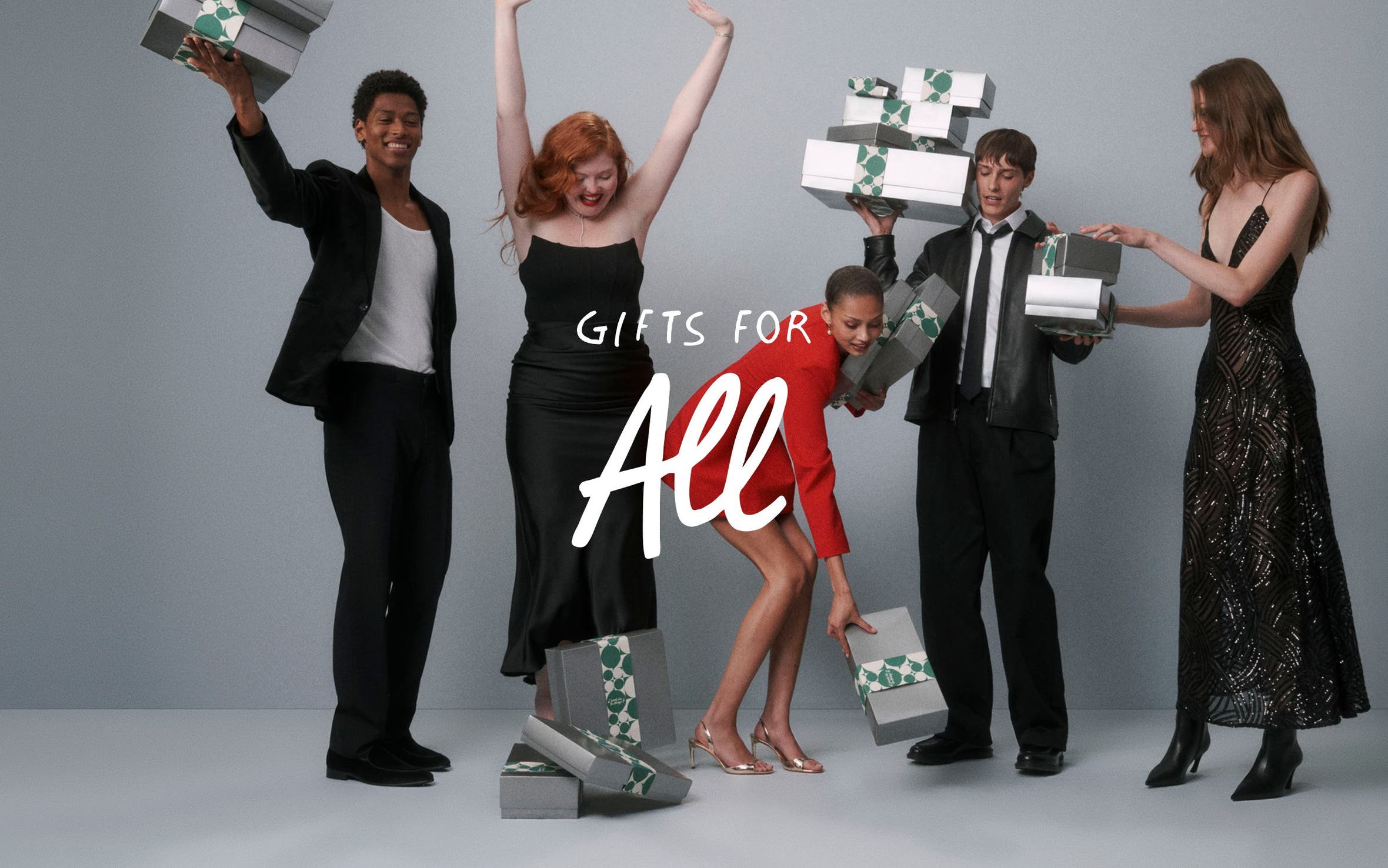 Gifts for all. Men and women in party clothes with gifts.