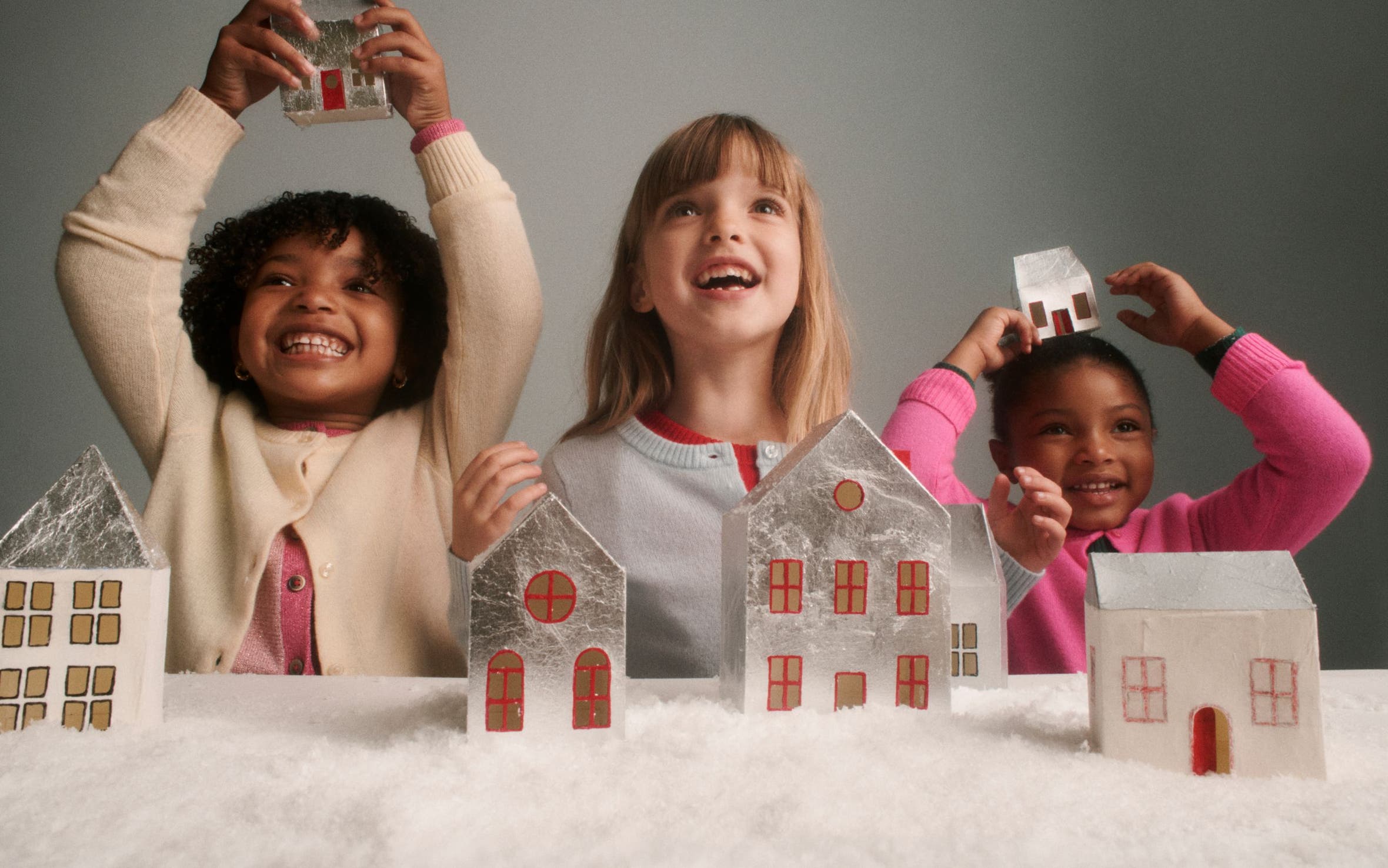 Children playing with holiday decor.