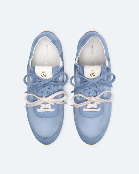 Blue Stuart Weitzman sneakers with blue and white double laces