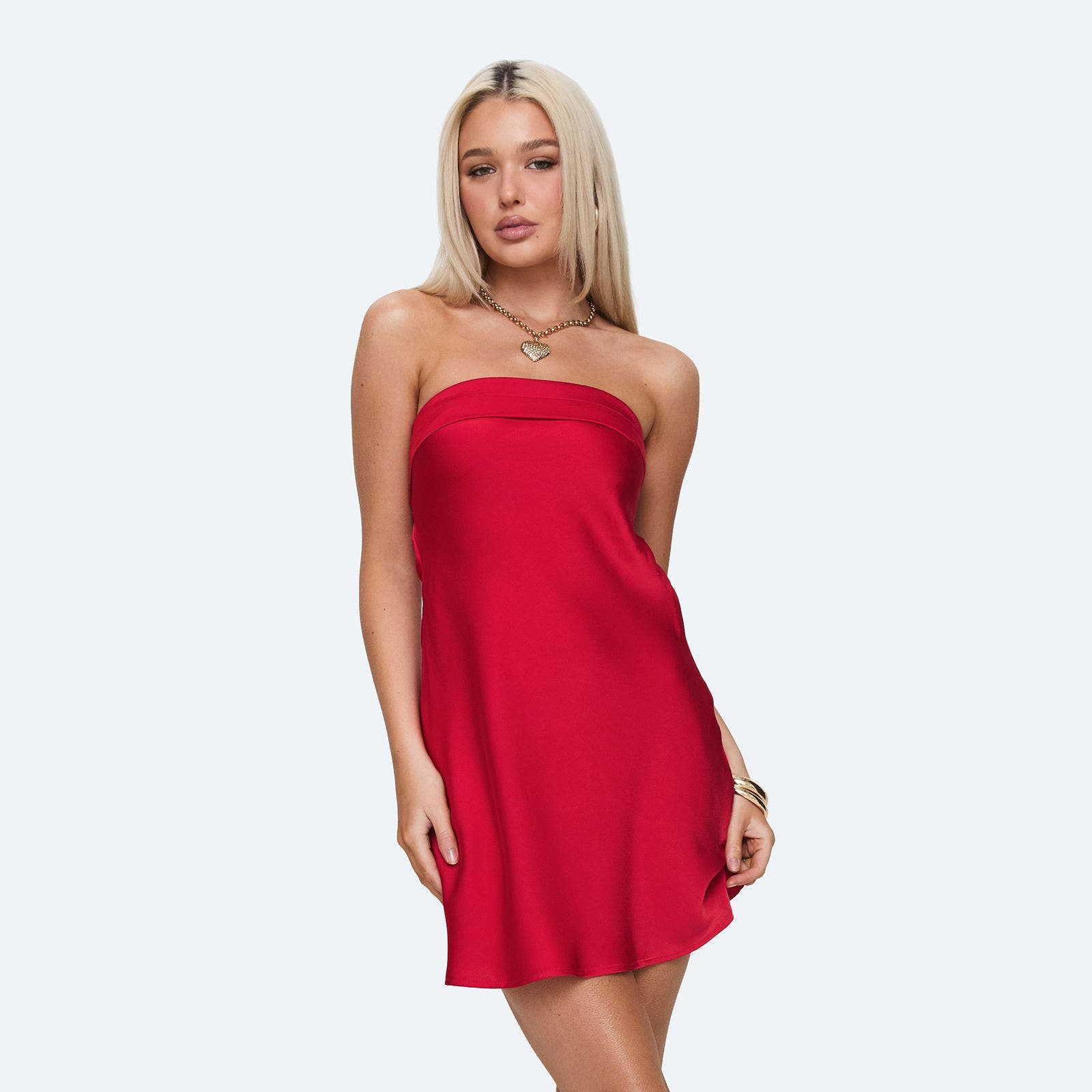A womna wearing a semi-formal red mini dress.