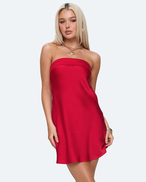 A womna wearing a semi-formal red mini dress.