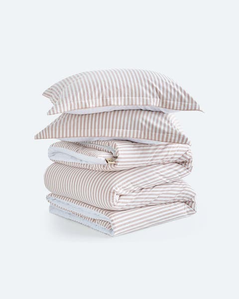 A stack of striped bedding.