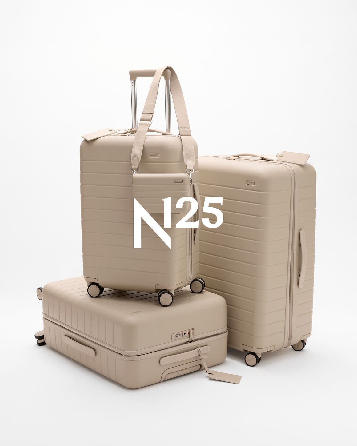 A set of beige luggage.