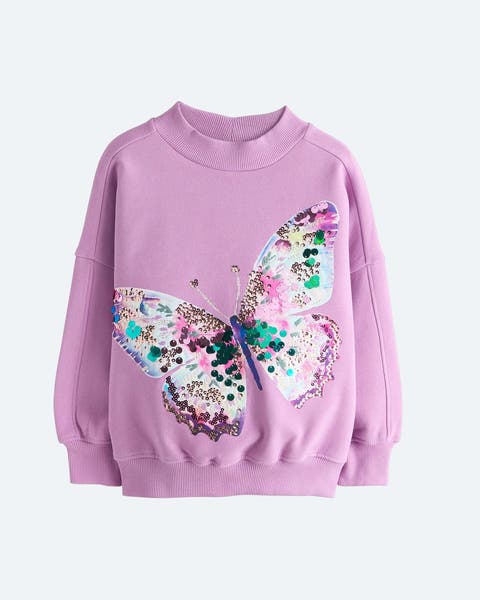 A pink top with a butterfly graphic for girls.