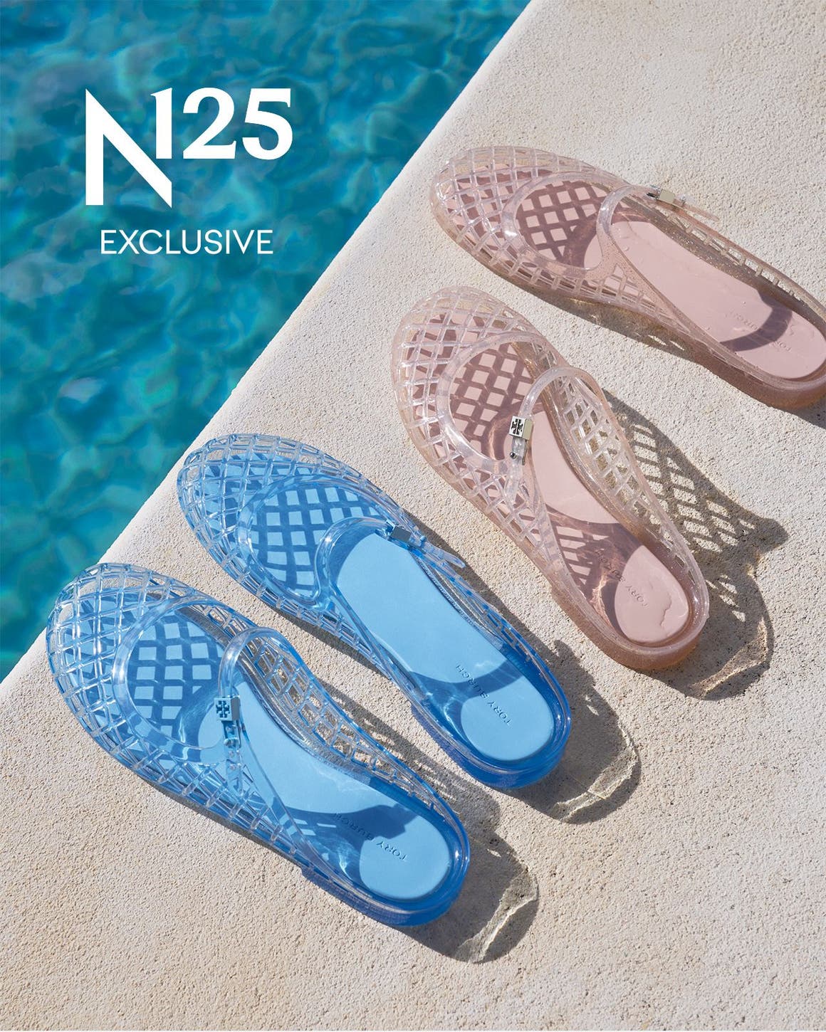 Blue and pink jelly shoes by a pool