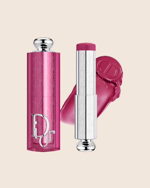 A pink DIOR lip balm with a deep berry bullet and a matching swatch.