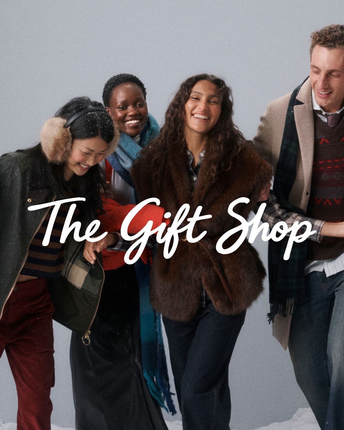 The gift shop. Men and women in winter outerwear.