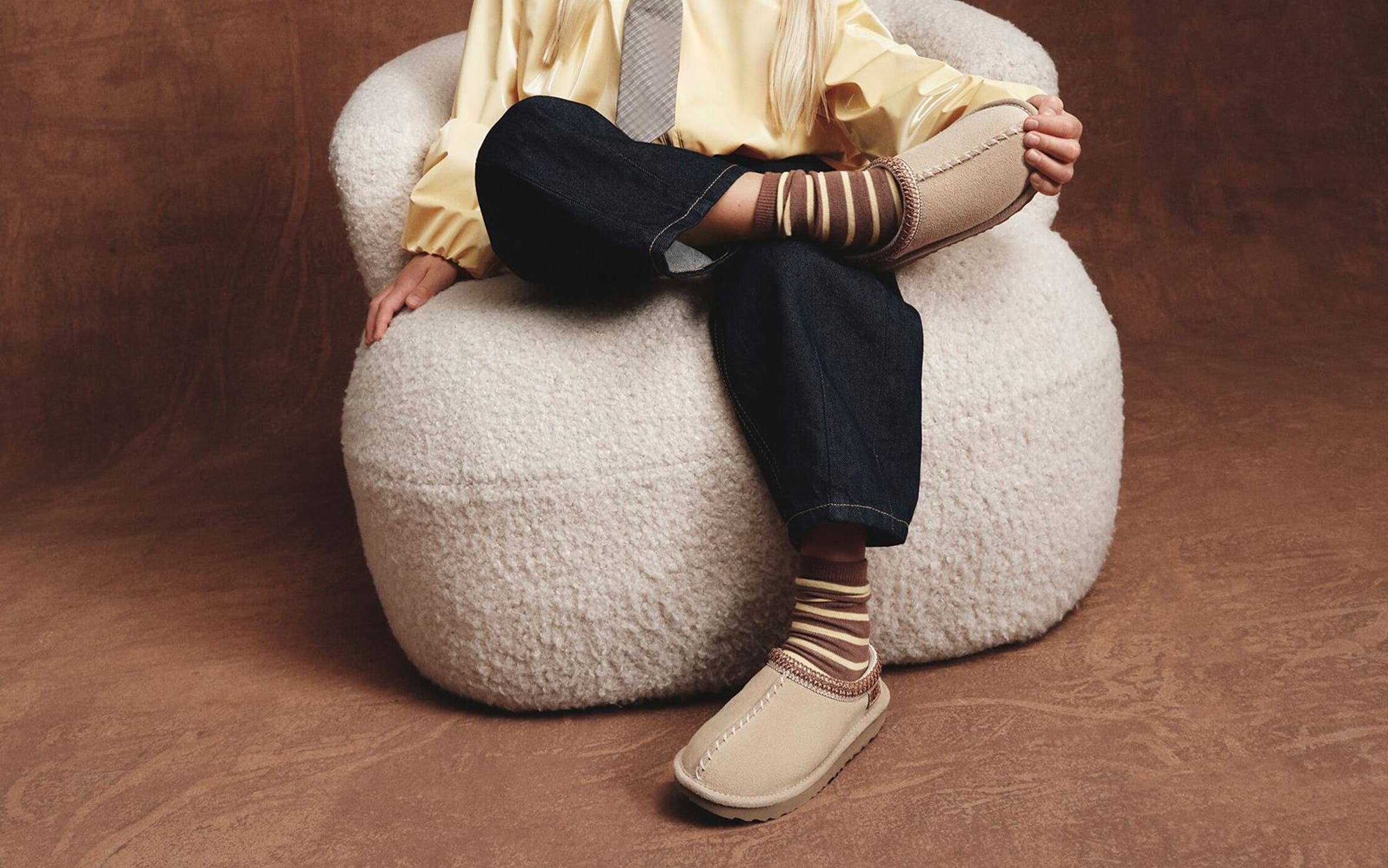 Young girl wearing UGG shoes.