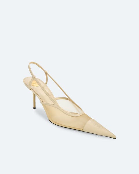 Ivory heels by Saint Laurent.